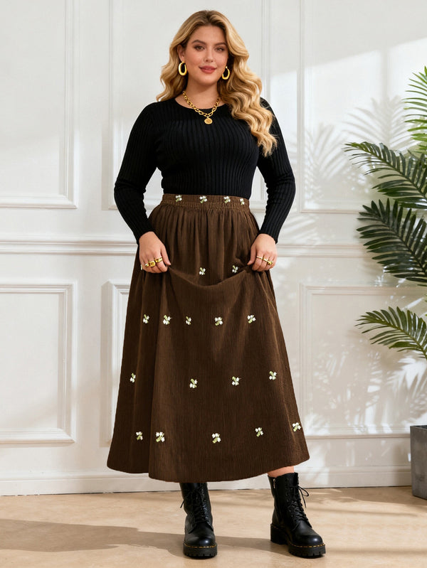 Brown midi skirt with allover small floral embroidery and wide gathered hem
