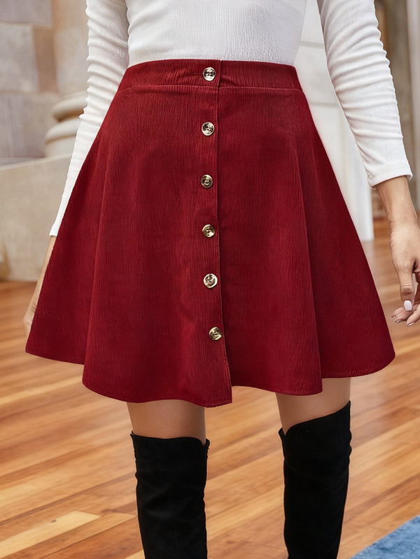Red textured mini skirt with front buttons and A-line waistband