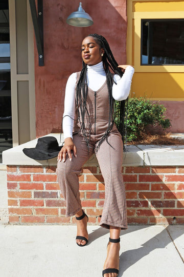 How to style plus size overalls for fall by layering a white turtleneck under checked overalls