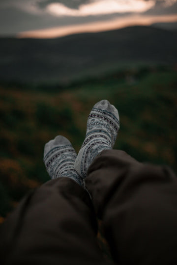 plus size hiking socks with nordic pattern styled for outdoor fall trail comfort