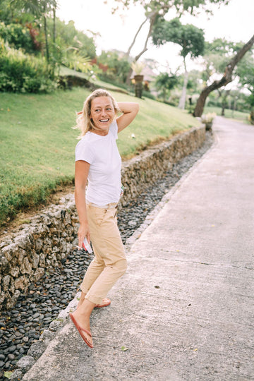 Plus size chinos styled with a white tee for an easy everyday walk