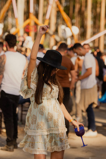 Woman enjoying an outdoor festival in a stand-out stylish outfit
