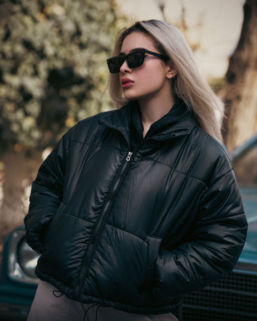 Woman wearing a padded puffer jacket for cold-weather warmth