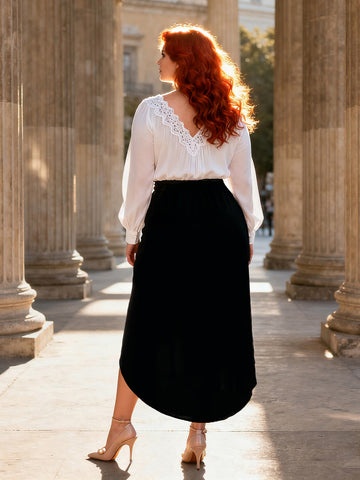 Black maxi skirt with elastic waistband, shown from back