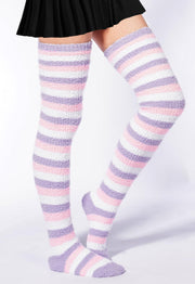 Pastel striped thigh-high socks, fuzzy knit, one pair worn with striped pattern