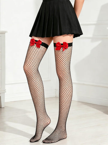 Black fishnet thigh-high stockings with red bow garters, full view