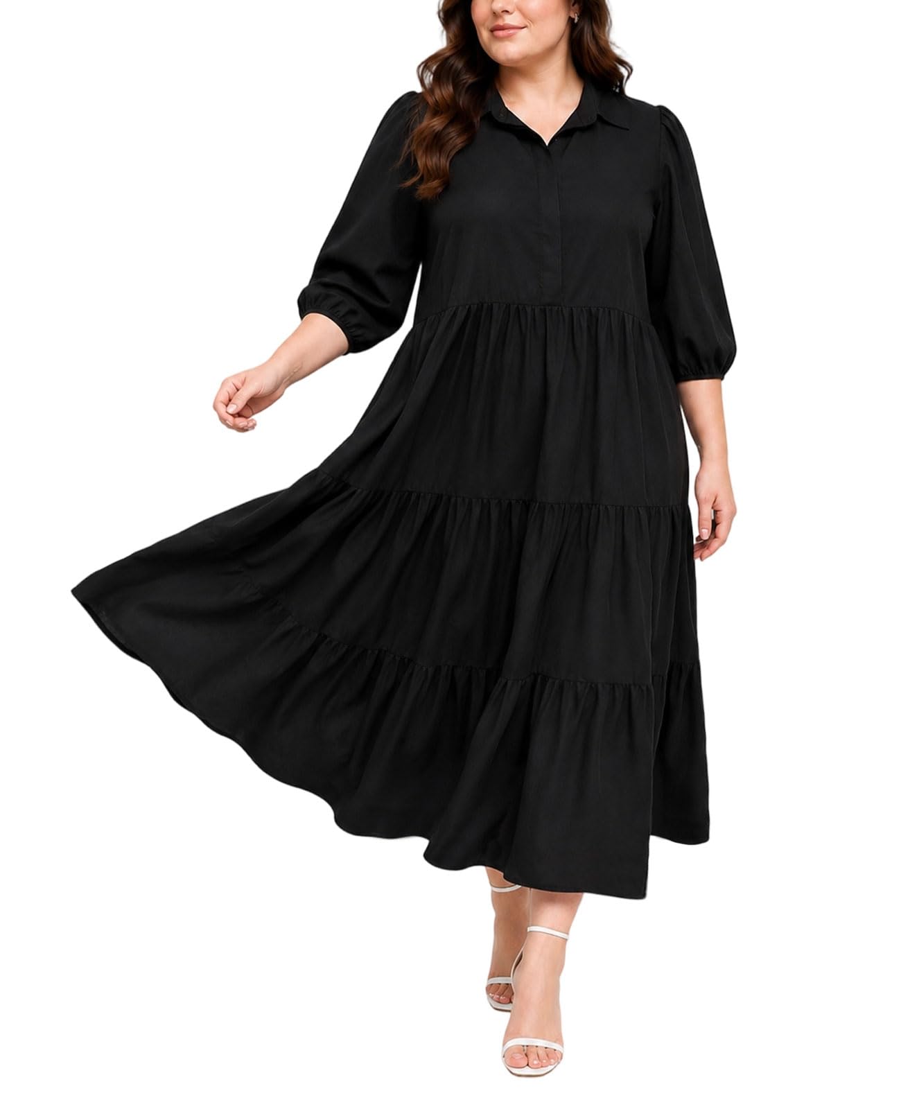 Black tiered shirt dress with long sleeves and buttoned collared neckline