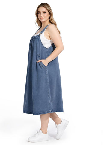 Denim overall dress with adjustable straps, square neckline, and side pockets