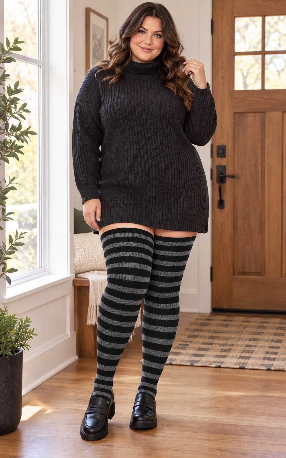 Cotton Plus Size Thigh High Socks-Black & Grey plus size thigh-high socks, Black & Grey pattern, worn by a plus-size woman in a lifestyle 02 scene; cuff reaches near the upper thigh and preserves the original knit texture