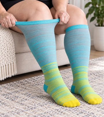Plus Size Wide Calf Compression Socks 8 Pair Bundle - Pattern Set 04 - knee-high wide-calf opening stretch demonstration