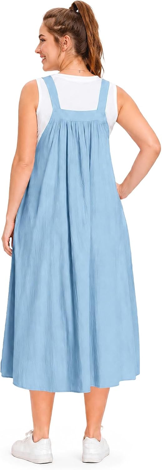 Light blue overall dress from the back view with adjustable straps and A-line hem