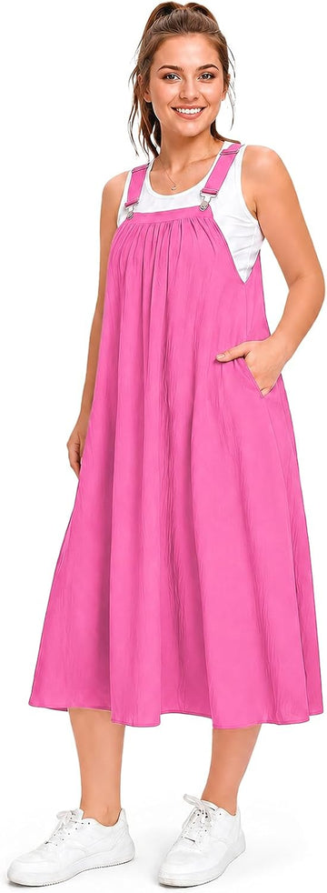 Hot pink A-line cotton overall dress with white-trimmed bib and wide straps