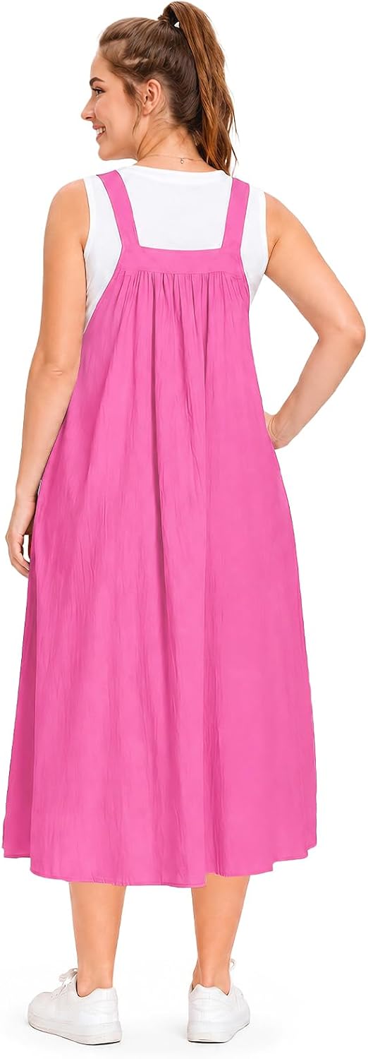 Hot pink cotton overall dress with adjustable straps and back pleated skirt