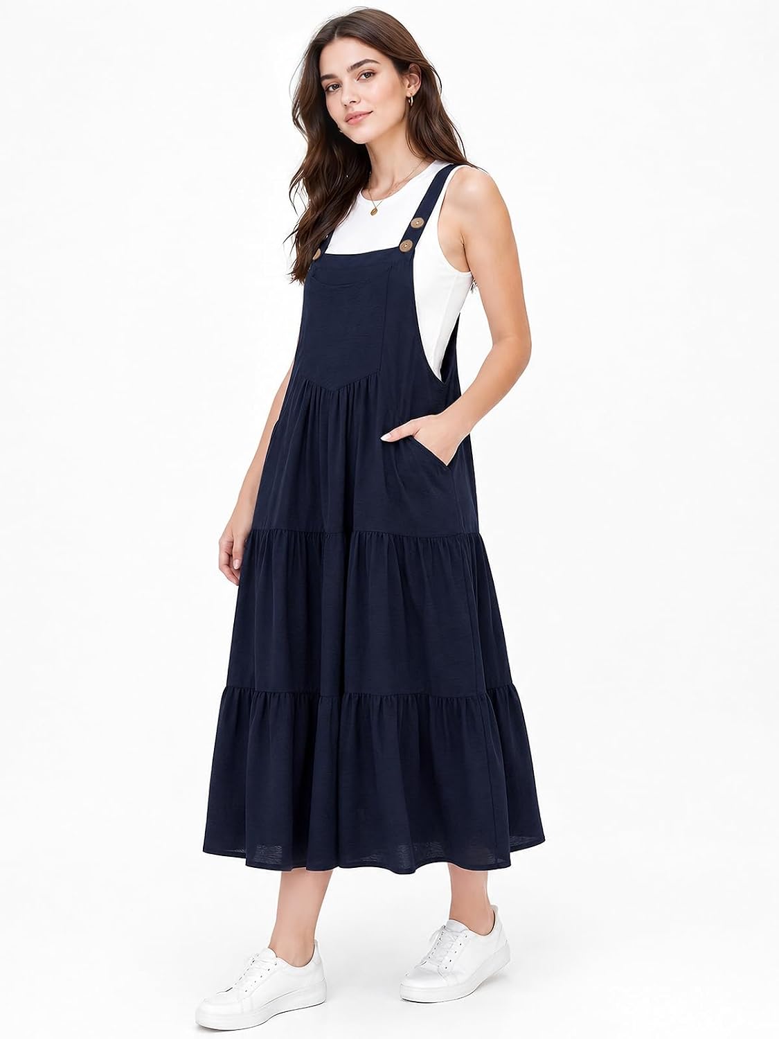 Navy sleeveless tiered midi overall dress with adjustable cross-back straps