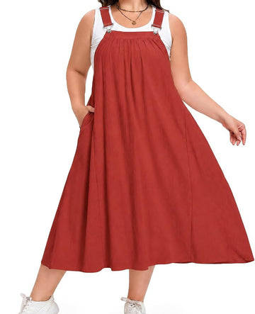 Rust sleeveless overall dress with adjustable straps, square neck, and pockets