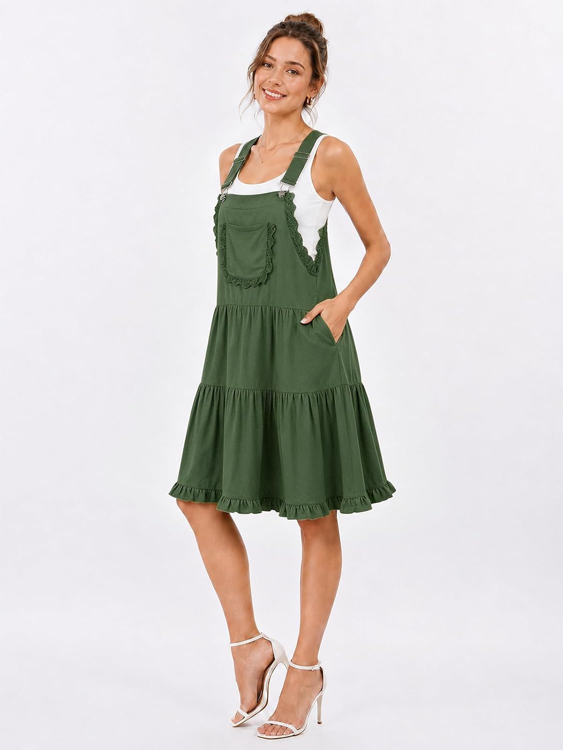 Short overall dress with adjustable straps, lace-trimmed front pocket, tiered skirt, green