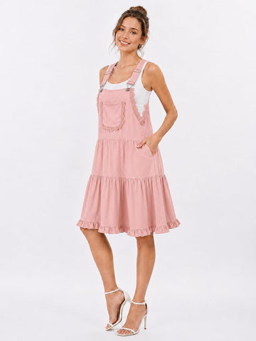 Pink tiered short overall dress with pockets and adjustable shoulder straps
