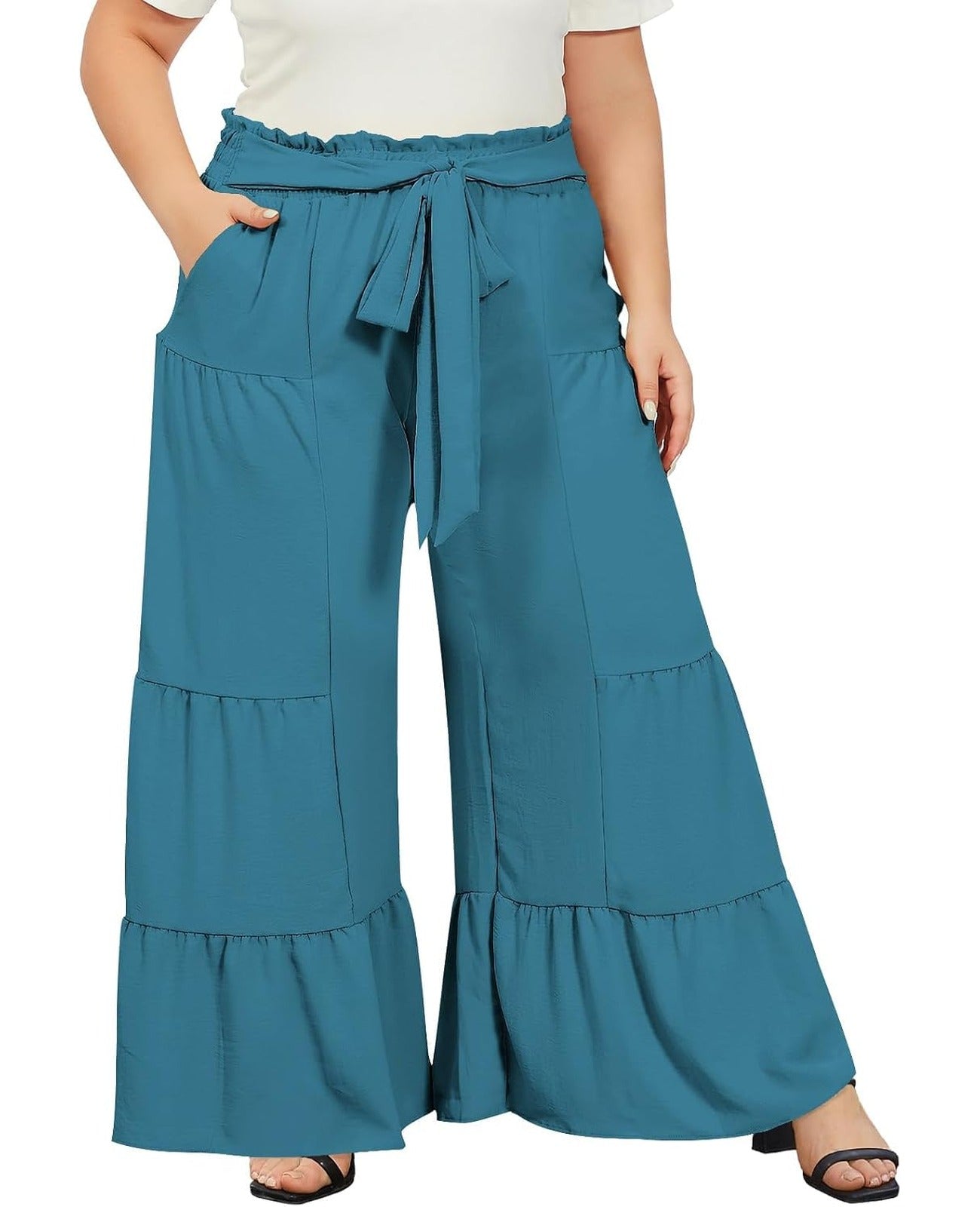 Turquoise plus-size palazzo pants with tie waist, tiered wide legs, and pockets