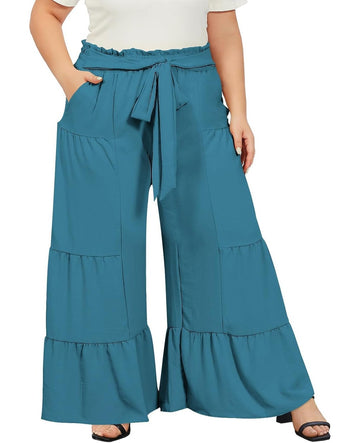 Turquoise plus-size palazzo pants with tie waist, tiered wide legs, and pockets