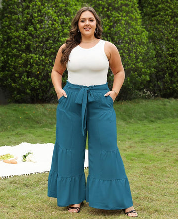 Turquoise plus-size palazzo pants with drawstring waist and tiered wide-leg design
