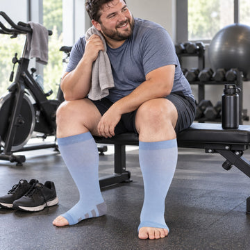 Plus Size Compression Socks Open Toe for Women& Men-Baby Blue plus-size male model sports scene 01; open toe construction and original product texture preserved