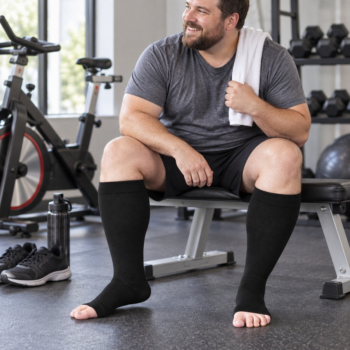 Plus Size Compression Socks Open Toe for Women& Men-Black plus-size male model sports scene 01; open toe construction and original product texture preserved