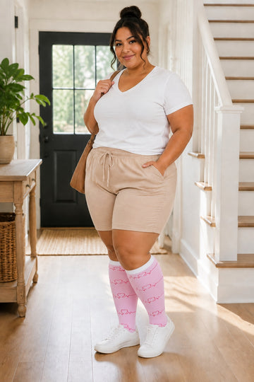 Plus Size Extra Wide Compression Socks 4 Pair Bundle - Pulse Pattern plus size AI model scene wearing Pink ECG Pattern variant