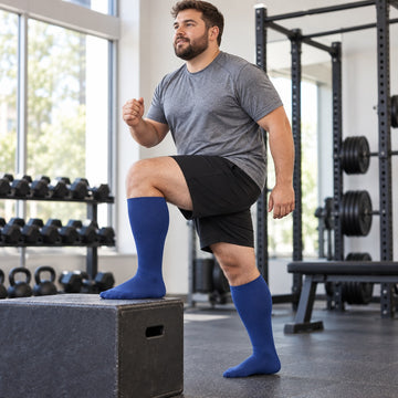 Plus Size Wide Calf Compression Socks 5 Pair Bundle - Royal Blue, Charcoal, Nude, White And Black Solid-Color Assortment - AI sports model scene 1