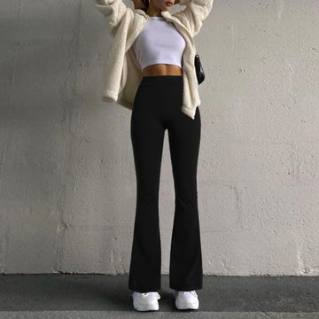 https://moonwoodwear.com/cdn/shop/files/scrunch-v-back-flare-leggings-black-MoonWood-2.jpg?v=1697704498&width=360