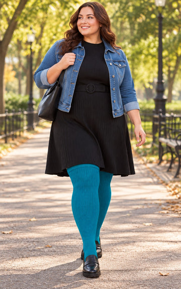 Women's plus size Blue Raspberry thigh high socks reaching the upper thigh in a lifestyle model scene 1