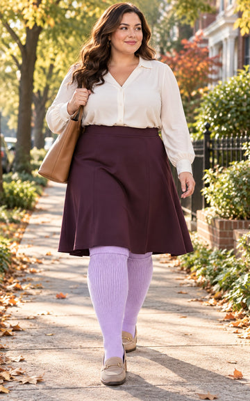 Women's plus size Lavender thigh high socks reaching the upper thigh in a lifestyle model scene 1