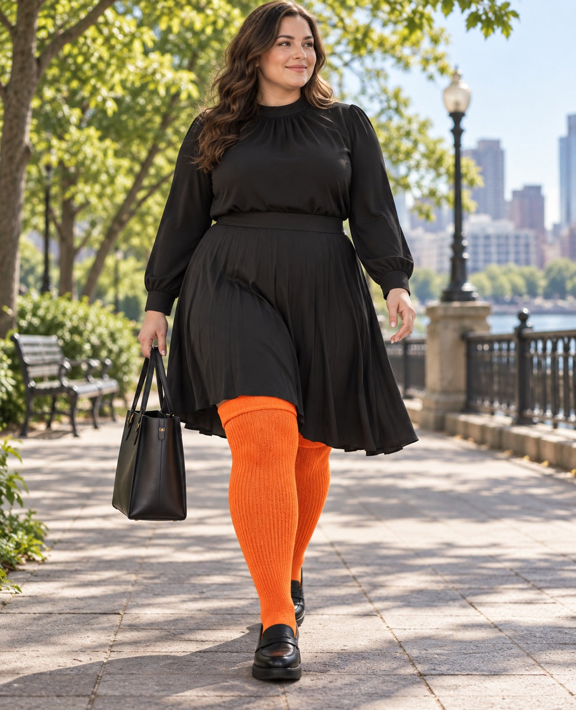 Women's plus size Neon Orange thigh high socks reaching the upper thigh in a lifestyle model scene 1