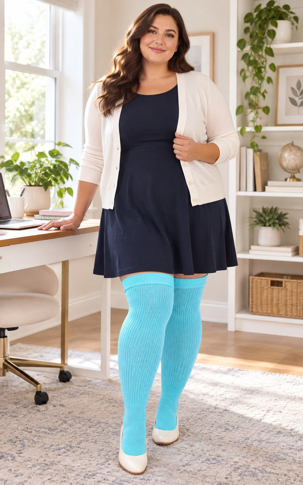 Women's plus size Pastel Blue thigh high socks reaching the upper thigh in a lifestyle model scene 2