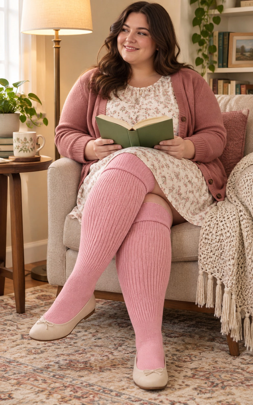 Women's plus size Salmon Pink thigh high socks reaching the upper thigh in a lifestyle model scene 2